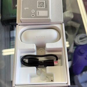 Sony White Earbuds with Charging Case